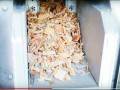 Zrębki w palniku na zrębki, trociny i biomasę Ze z ruchomym paleniskiem schodkowym i koszem 1m3.