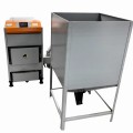 Kocioł Biowarmer 26 kW CWD: widok z przodu kotła na pellet i zrębki z podajnikiem.