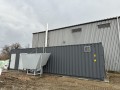 Kotłownia mobilna na zrębki drzewne i pellet 250 kW. Kontenerowa kotłownia z zasobnikiem na paliwo.